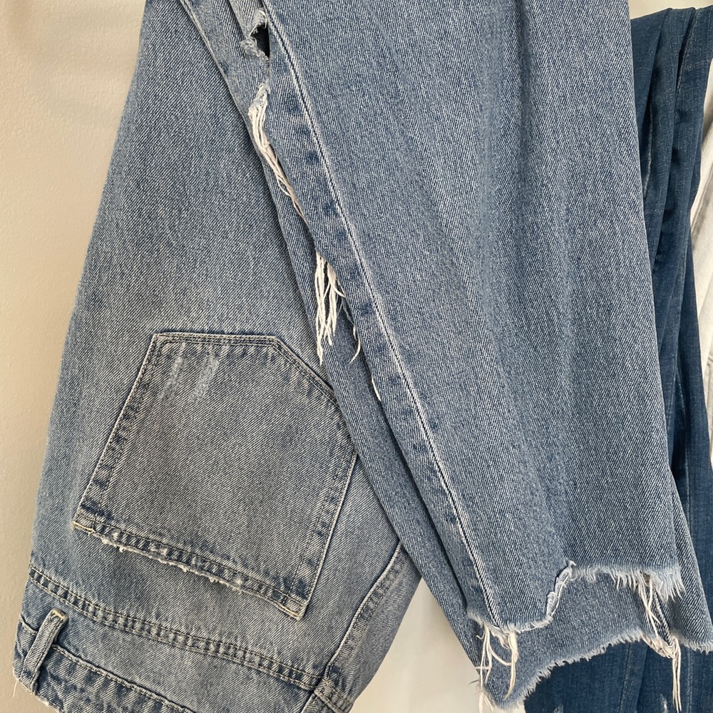 Distressed Blue Denim Jeans